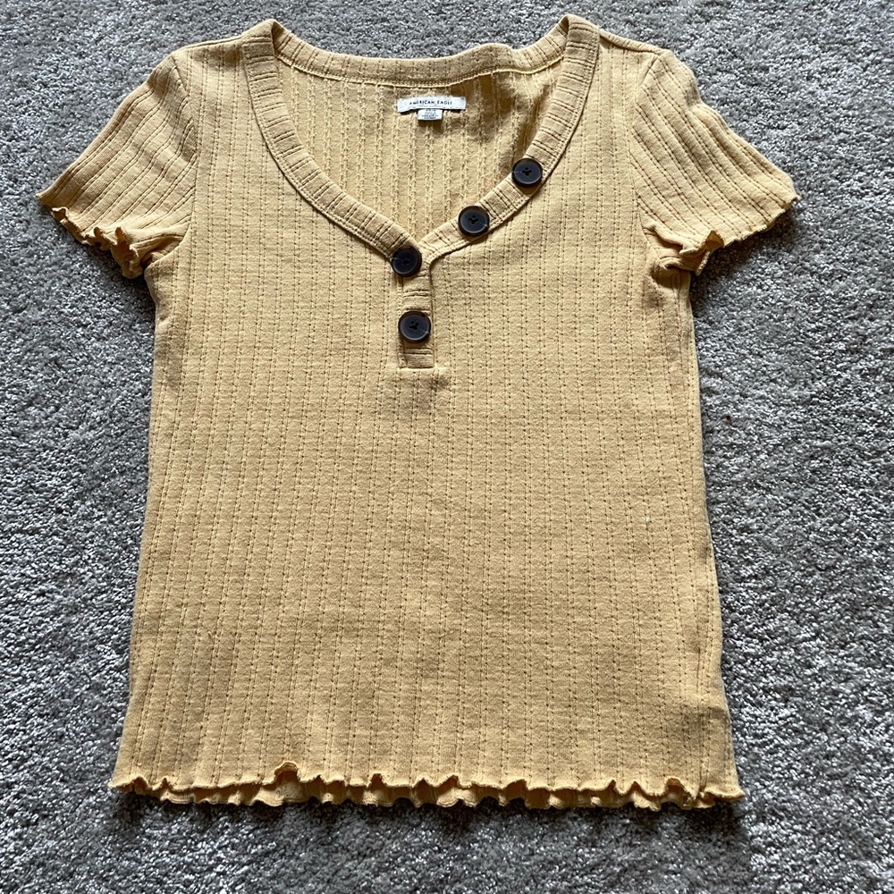 American eagle yellow short sleeve shirt. Size small.
